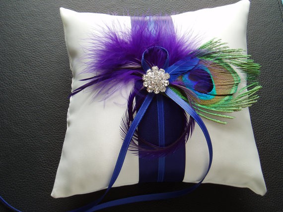  peacock themed wedding is to include deep jewel tones like this purple 